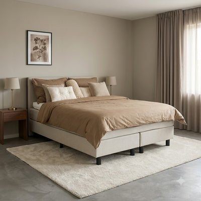Spring Cloudy boxspring schuin gezien, compleet met matras